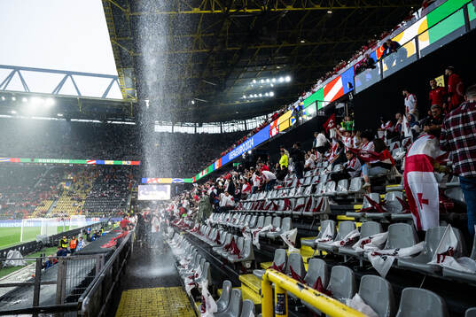 General view as rain falls inside the stadium