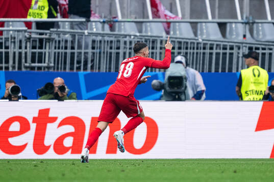 Mert Muldur of Türkiye celebrates