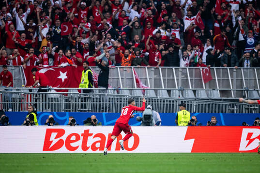 Mert Muldur of Türkiye celebrates