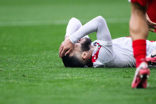 Georges Mikautadze of Georgia looks dejected