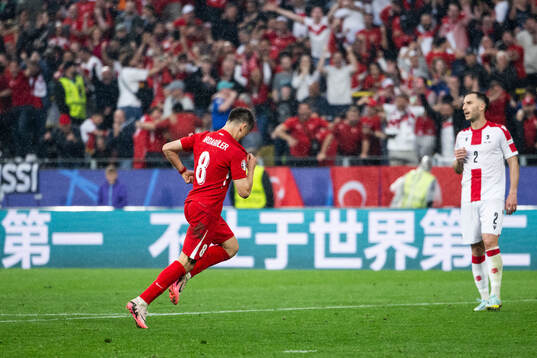 Arda Guler of Türkiye celebrates