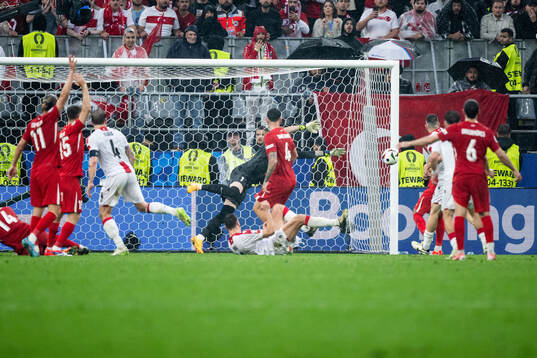 The ball hits the post