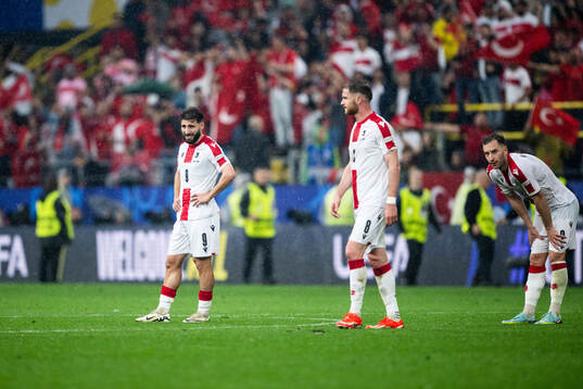 Zuriko Davitashvili of Georgia looks dejected
