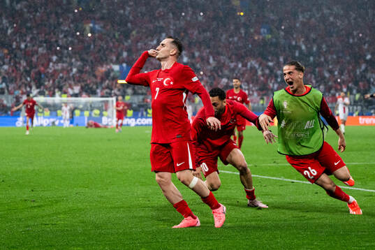 Kerem Akturkoglu of Türkiye celebrates