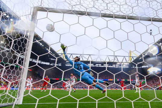 Giorgi Mamardashvili of Georgia lets in 1-0 by Mert Muldur