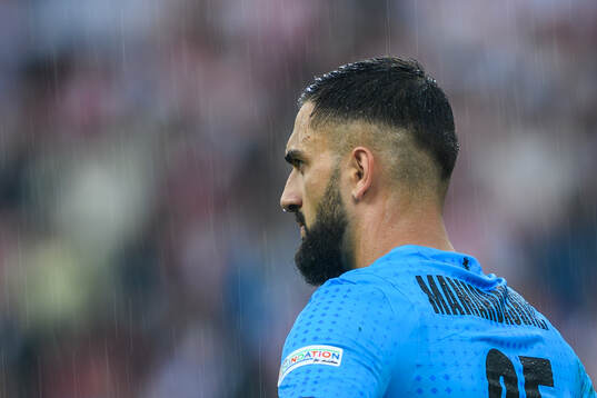 Giorgi Mamardashvili of Georgia looks dejected