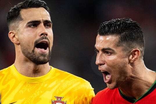 Diogo Costa and Cristiano Ronaldo of Portugal