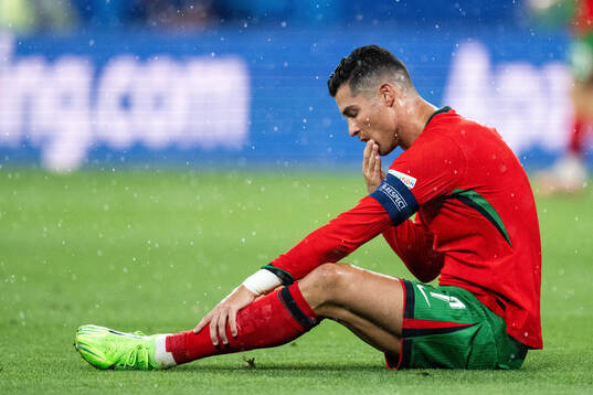 Cristiano Ronaldo of Portugal in pain