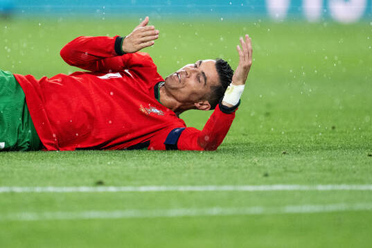 Cristiano Ronaldo of Portugal in pain