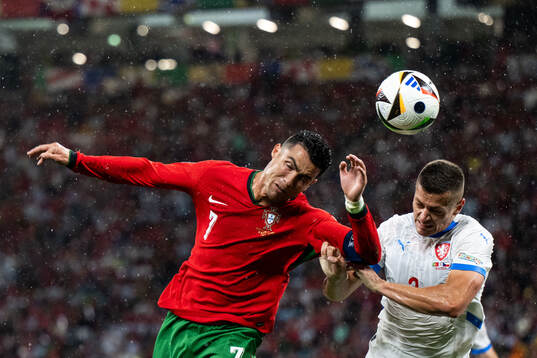 Cristiano Ronaldo of Portugal and Tomas Holes of Czech