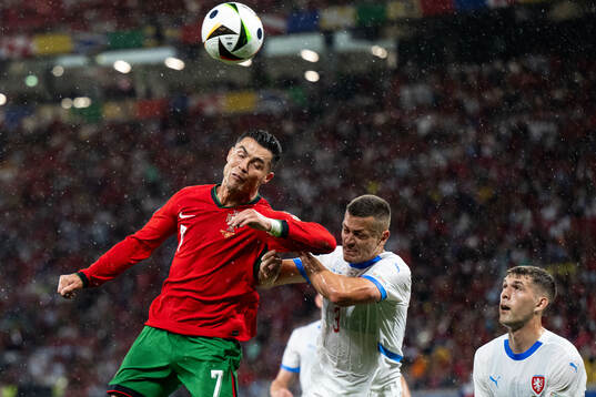 Cristiano Ronaldo of Portugal and Tomas Holes of Czech