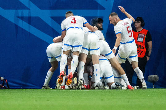 Lukas Provod of Czech Republic celebrates with team mates