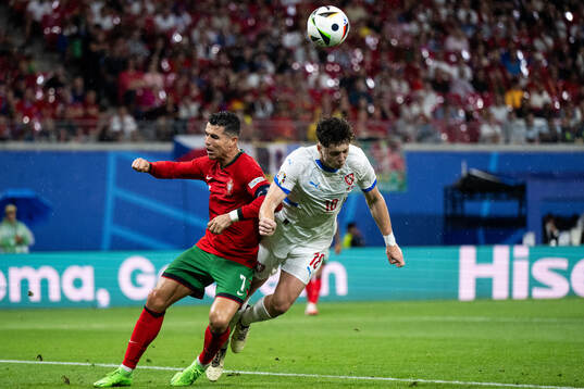 Cristiano Ronaldo of Portugal and Ladislav Krejci of Czech