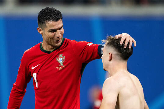 Francisco Conceicao of Portugal celebrates with Cristiano