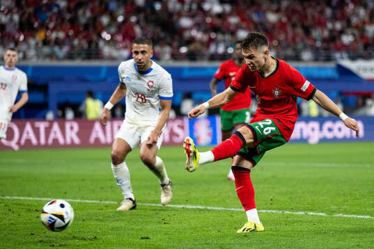 Francisco Conceicao of Portugal scores 2-1