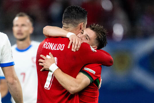 Cristiano Ronaldo and Francisco Conceicao celebrate