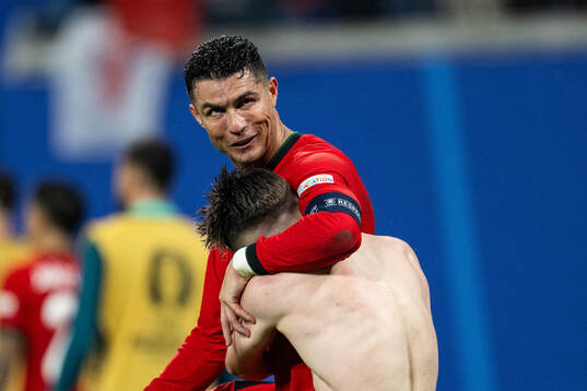 Cristiano Ronaldo and Francisco Conceicao of Portugal