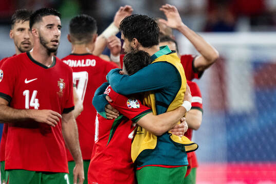 Francisco Conceicao and Ruben Neves of Portugal celebrate