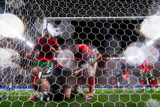 Goalkeeper Jindfich Stanek of Czech Republic fights with