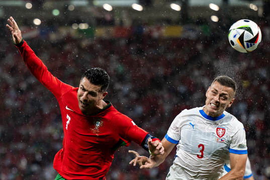 Cristiano Ronaldo of Portugal and Tomas Holes of Czech