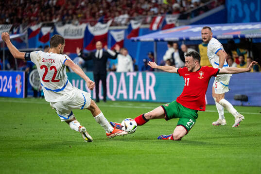 Tomas Soucek of Czech Republic and Diogo Jota of Portugal