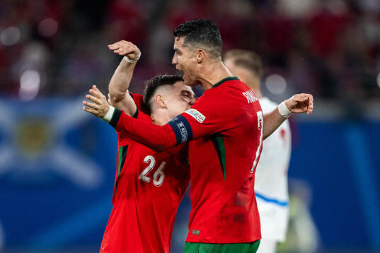 Francisco Conceicao and Cristiano Ronaldo of Portugal