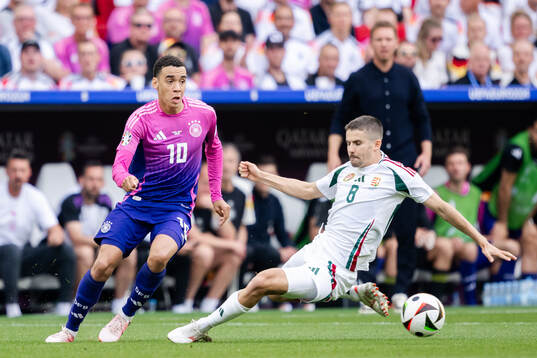 Jamal Musiala of Germany and Adam Nagy of Hungary