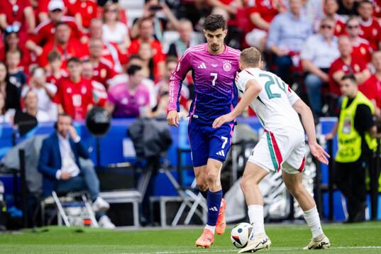 Kai Havertz of Germany and Marton Dardai of Hungary