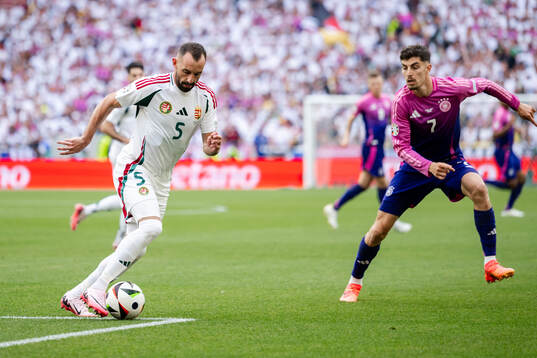 Willi Orban of Hungary and Kai Havertz of Germany