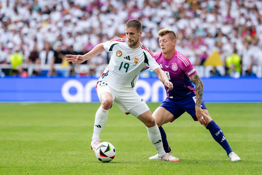 Barnabas Varga of Hungary and Toni Kroos of Germany