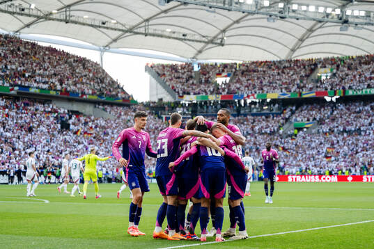 Jamal Musiala of Germany celebrates with teammates