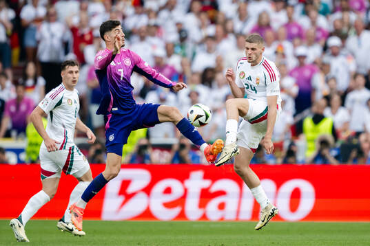Kai Havertz of Germany and Marton Dardai of Hungary