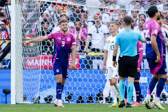 Niclas Fuellkrug of Germany reacts