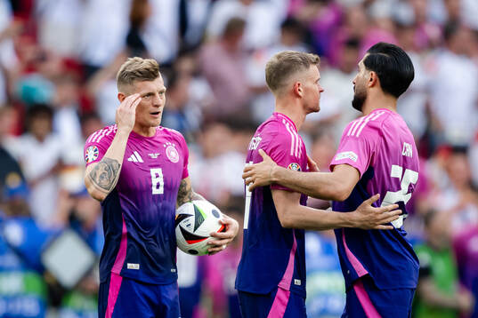 Toni Kroos and Emre Can  of Germany