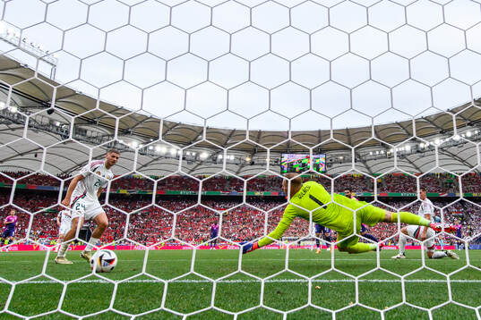 goalkeeper Peter Gulacsi of Hungary lets in 2-0 by Ilkay