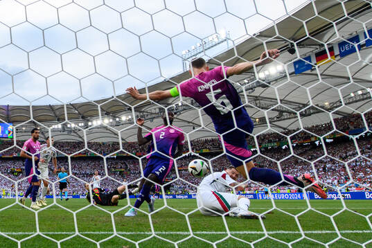Joshua Kimmich of Germany saves a ball