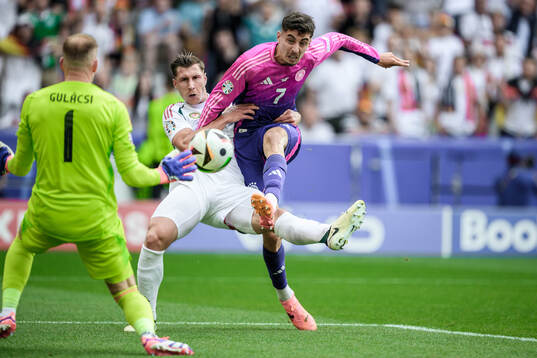 Kai Havertz of Germany against Willi Orban of Hungary