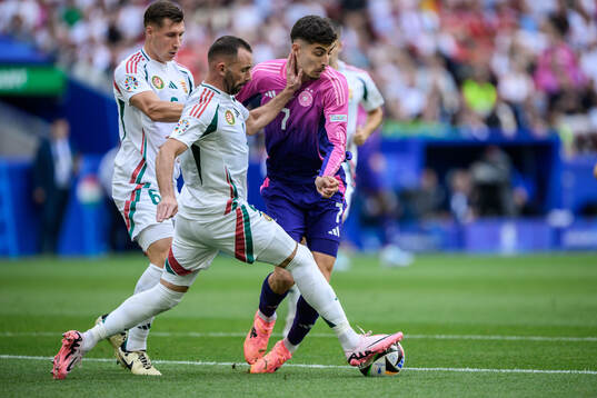 Attila Fiola of Hungary and Kai Havertz of Germany