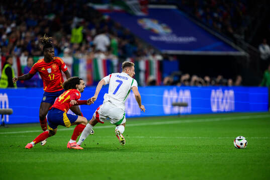 Nicholas Williams and Marc Cucurella of Spain against