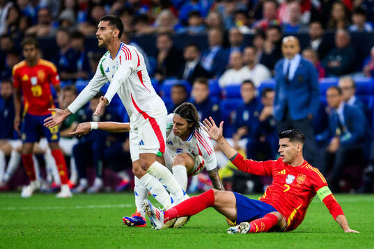Lorenzo Pellegrini and Riccardo Calafiori of Italy against