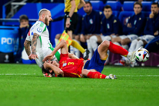 Federico Dimarco of Italy and Robin Aime Le Normand