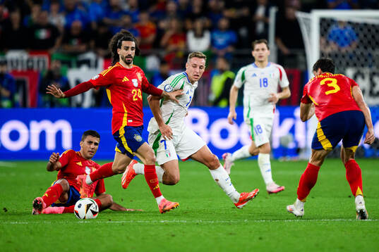 Robin Aime Le Normand Mainfray and Marc Cucurella of Spain