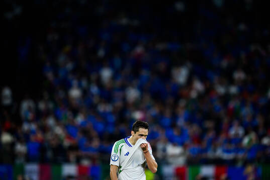 Federico Chiesa of Italy looks dejected