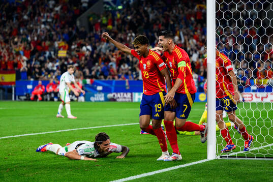 Lamine Yamal and Alvaro Morata of Spain celebrate while