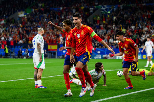 Lamine Yamal and Alvaro Morata of Spain celebrate