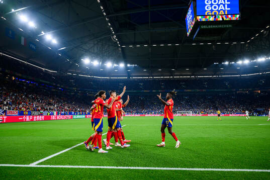 Players of Spain celebrate
