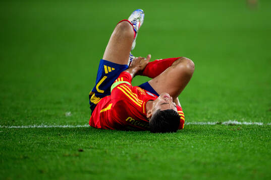 Alvaro Morata of Spain in pain
