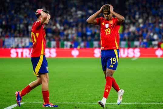Lamine Yamal of Spain looks dejected