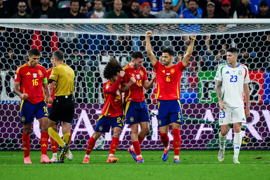 Marc Cucurella, Aymeric Laporte and Mikel Merino of Spain