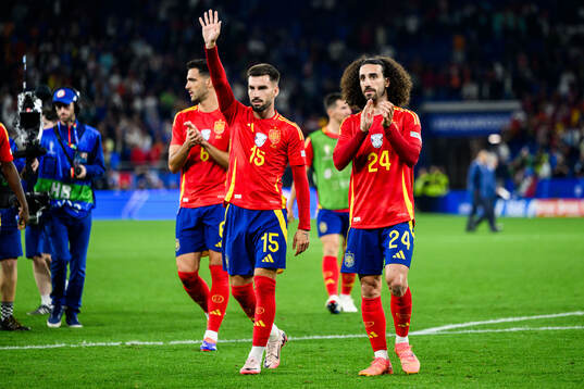 Alejandro Baena and Marc Cucurella of Spain celebrate